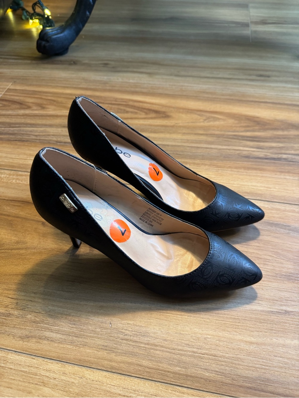 bebe Black Pointed Toe Low Heel Pumps with Subtle Embossing